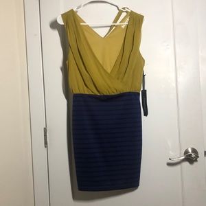 body con dress with mustard v neck top, black and blue striped bottom